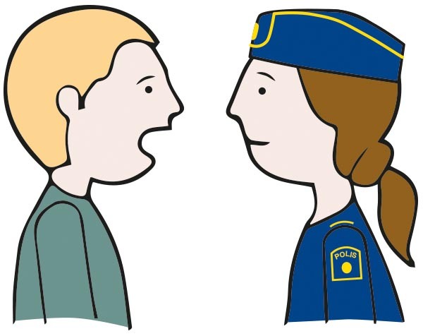En person pratar med en polis.